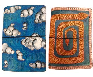 Two examples of leather tooling created by high school students - 01