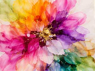 a painted tile showing pink, purple and  orange flower