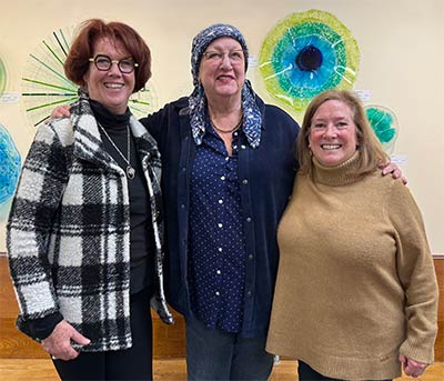 photo showing a scene from the opening reception for Glass Art