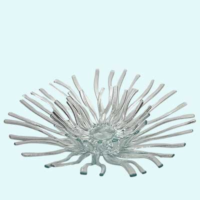 a clear glass flower with countless slender petals